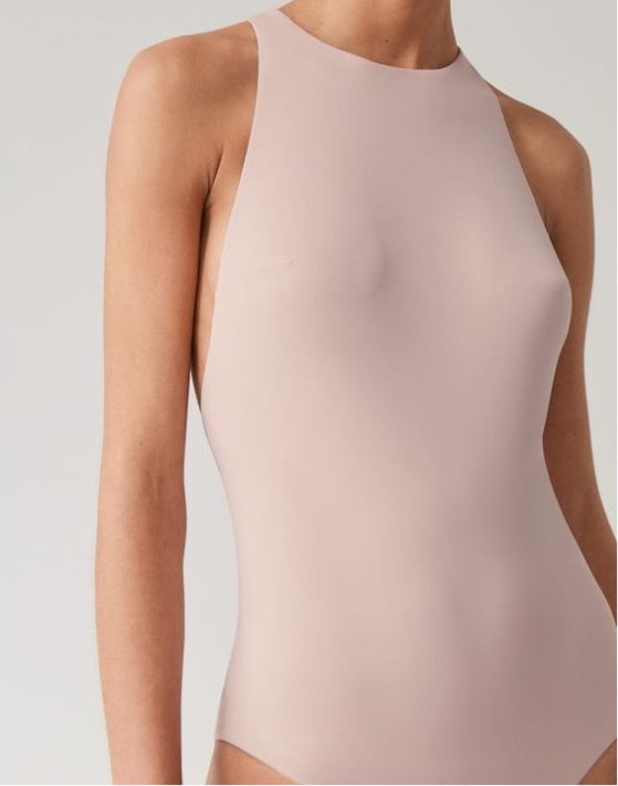 Women Standing in athletic wear after getting a vaccum therapy